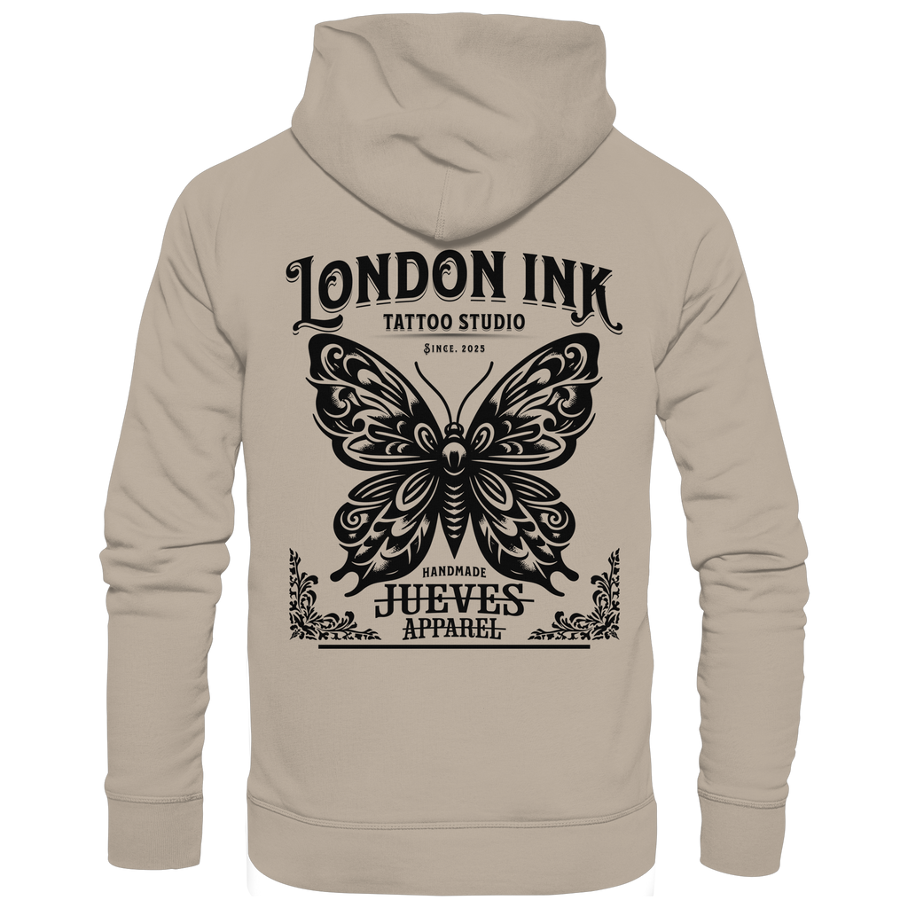 Rückansicht eines beigen klassischen Hoodies von Jueves Apparel aus 100 % Baumwolle, 350 g/m² – markanter Rückendruck und urbaner Streetwear-Look mit modernem Schnitt. 