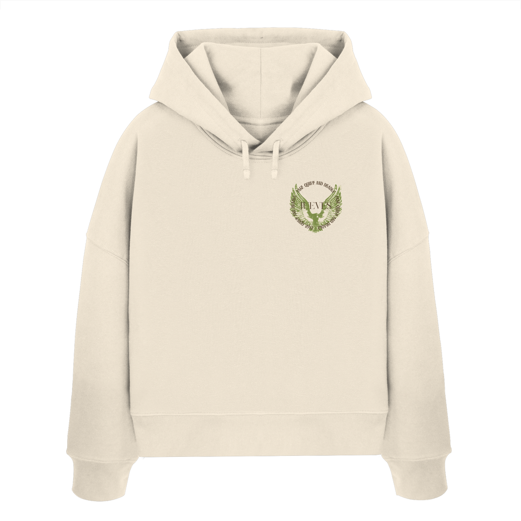 Frontansicht des beigen Damen oversized Boxcut Hoodies von Jueves Apparel mit oversized Schnitt, Druck auf der Brust– Streetwear aus 100 % Bio-Baumwolle, 300 g/m² Stoffgewicht. 