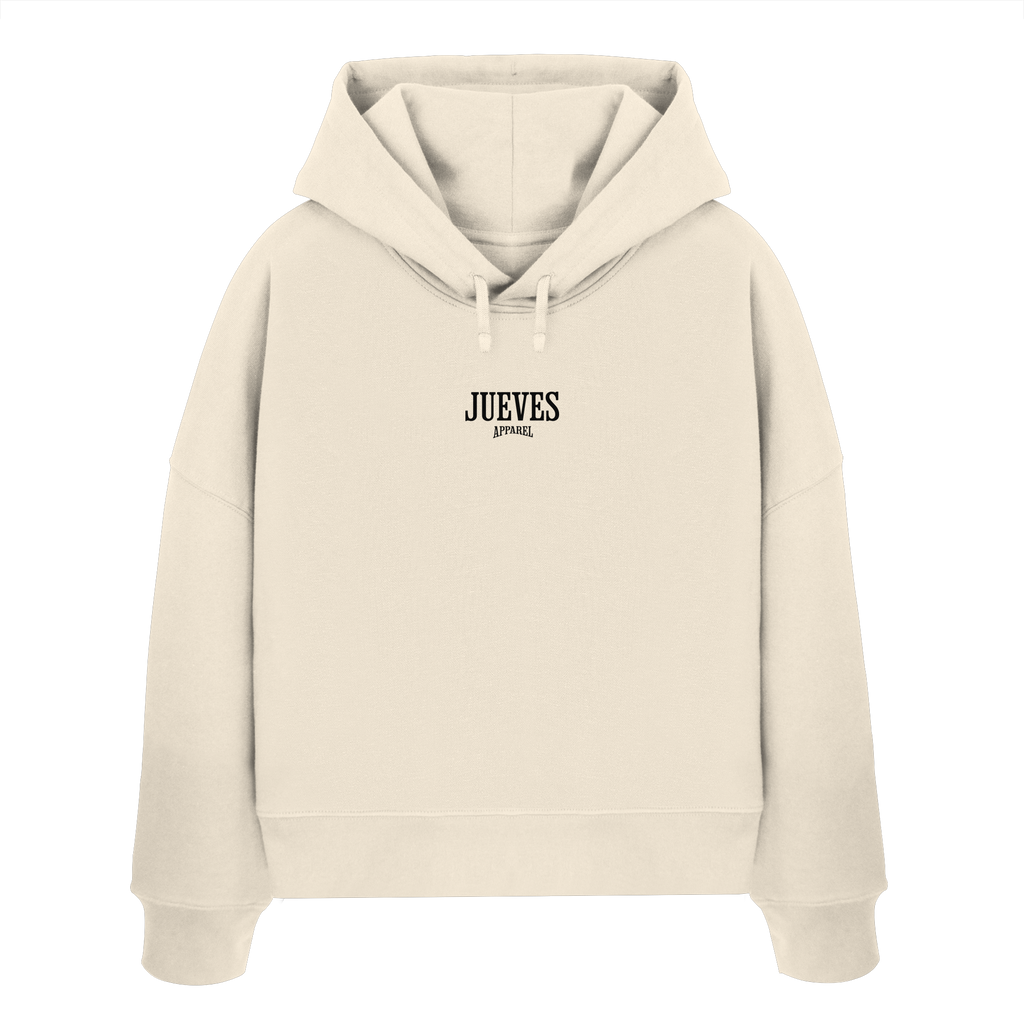 Frontansicht des beigen Damen oversized Boxcut Hoodies von Jueves Apparel mit oversized Schnitt, Druck auf der Brust– Streetwear aus 100 % Bio-Baumwolle, 300 g/m² Stoffgewicht. 