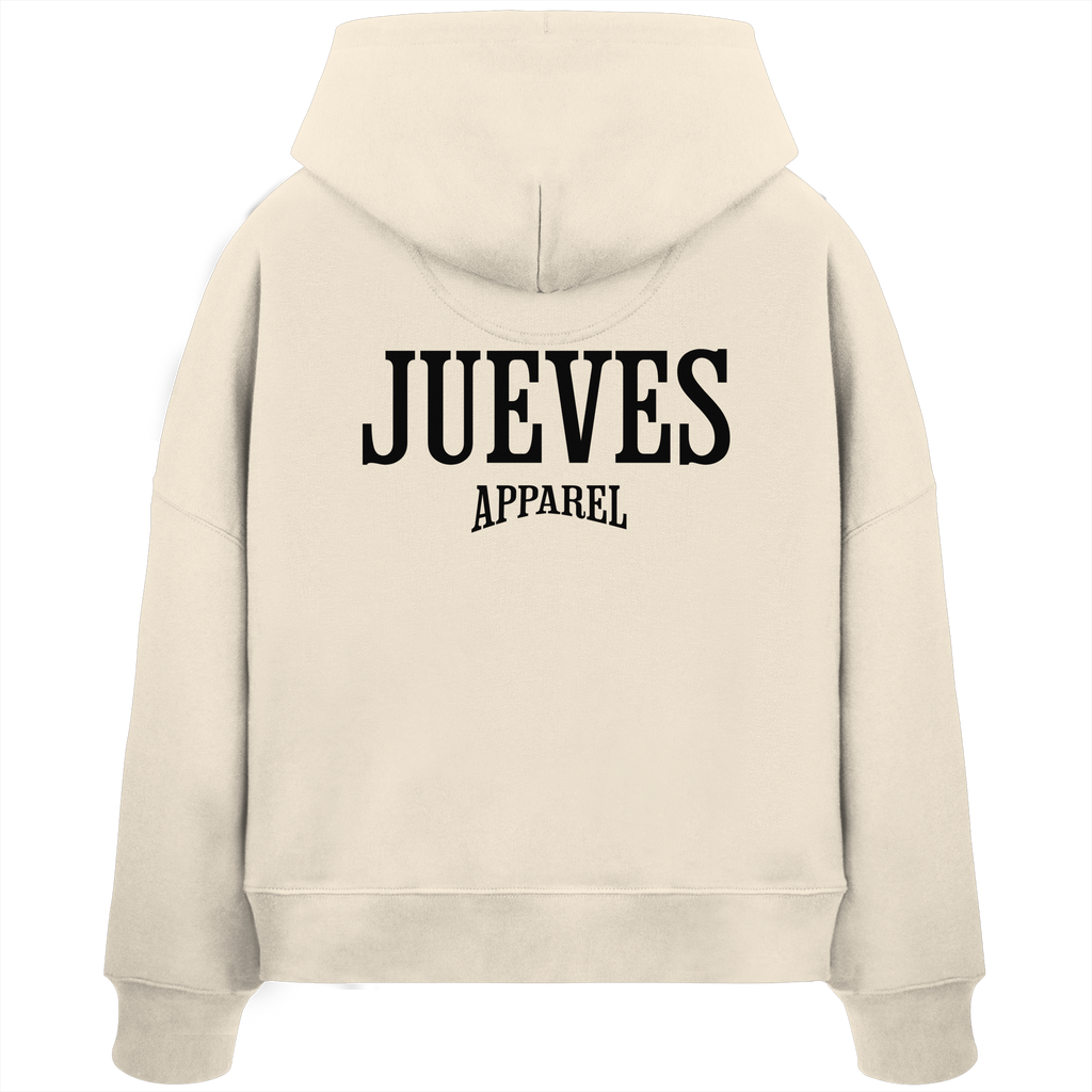 Rückansicht eines beigen Damen Oversized Boxcut Hoodies von Jueves Apparel aus 100 % Baumwolle, 300 g/m² – markanter Rückendruck und urbaner Streetwear-Look mit modernem Schnitt. 